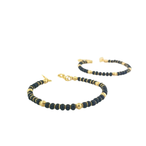 Two bracelets featuring black and gold beads by OM Jewellers Perth