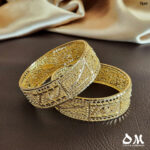 Fancy design wide gold bangle pair set