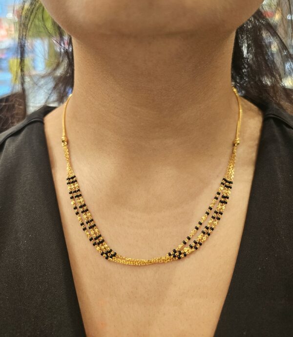 Gold mangalsutra necklace